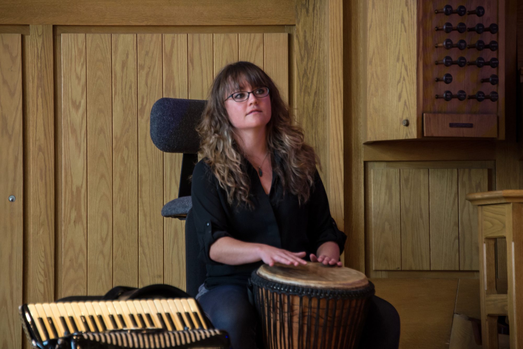 Katrina Hedrick playing drums